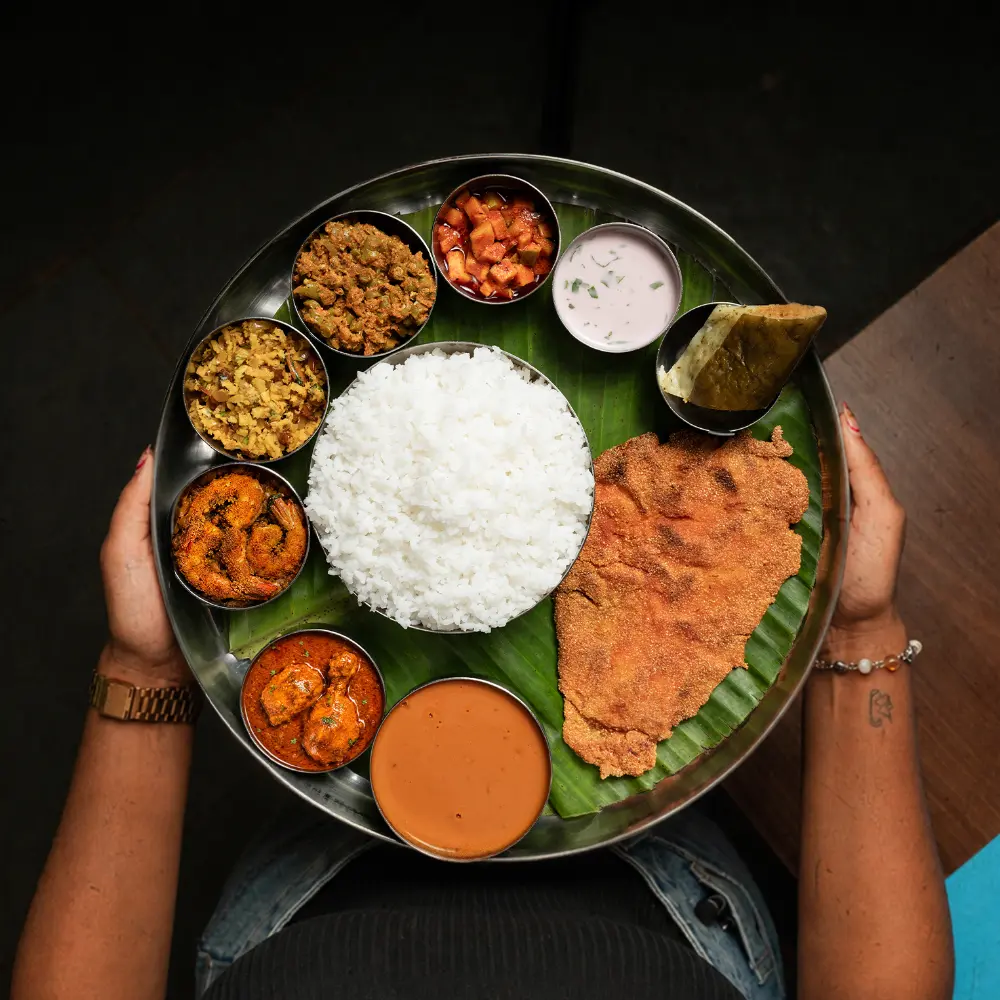 The pomfret, prawns and chicken vindaloo are a big part of the non-veg thali