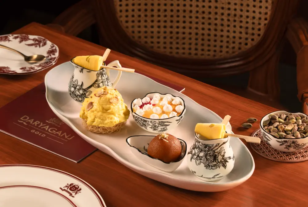 A dessert platter with Gulab Jamun and Kulfi