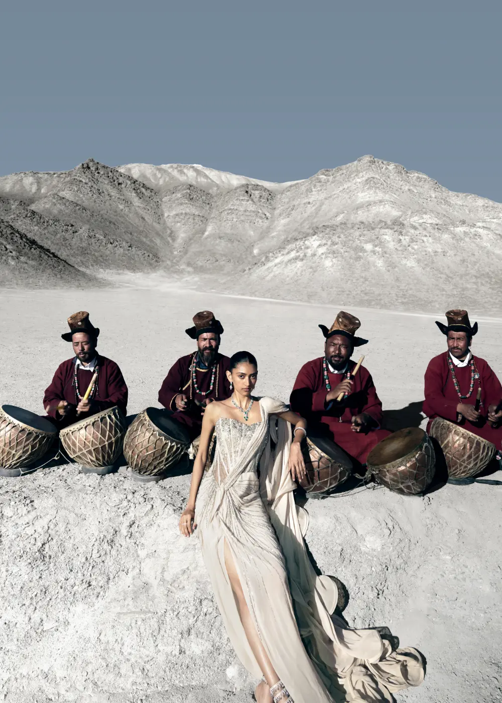Dhyany in a Meteoric saree gown with asymmetric corset and ruffle pallu with crystal embroidery, with people from Ladakh