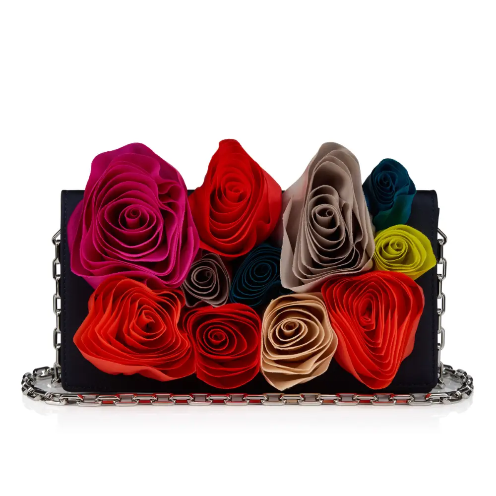 Louboutin's Bettina clutch with Mere Lachaise hand-crafted flowers