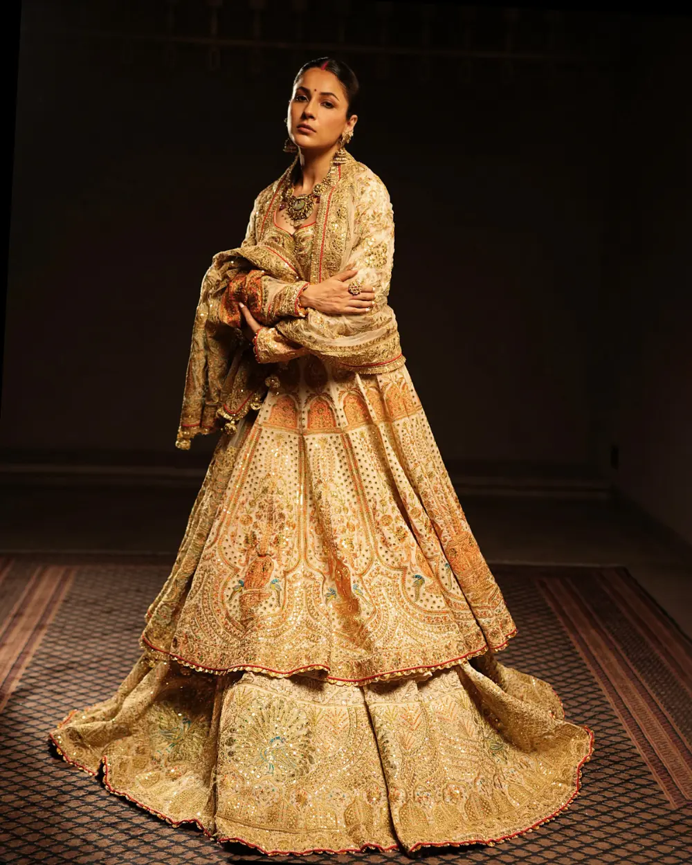 A regal Mughal inspired lehenga with an ornate dupatta